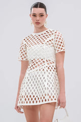 SHE'S DIFFERENT CUT OUT FAUX LEATHER MINI DRESS IN WHITE